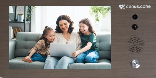 Parent working on laptop with her kids in Genus Care