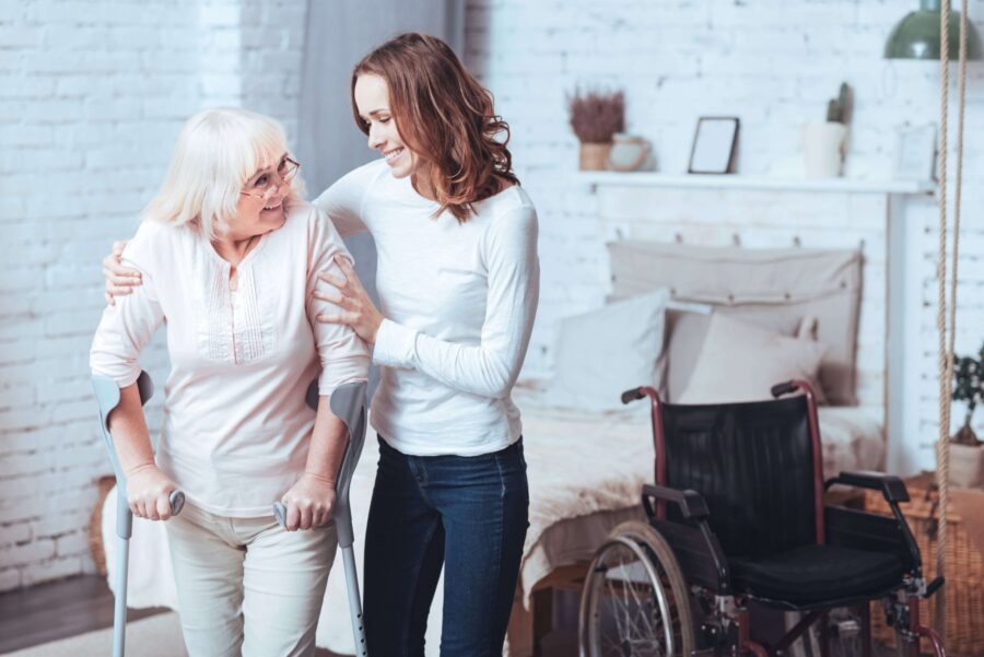 woman-assisting-oldwoman